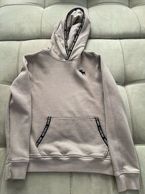 abercrombie kids light gray hoodie with black logo trim